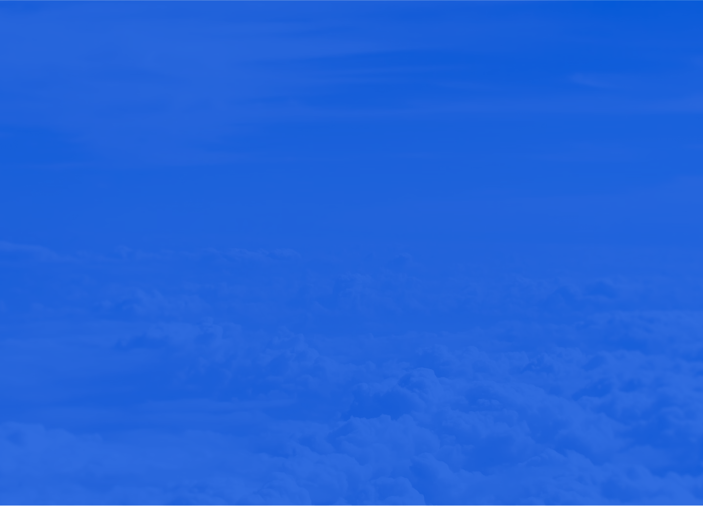 a cloudy sky with a blue overlay